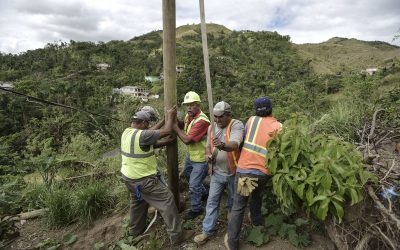 Puerto Ricans grab machetes, shovels to help restore power