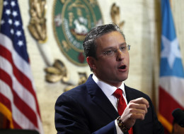 Puerto Rico Gov. Alejandro Garcia Padilla speaks during a state of the commonwealth address at the Capitol building in San Juan, Puerto Rico, Thursday, April 25, 2013.